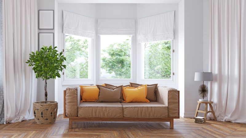 white thermal curtains and roman blinds in a modern living room